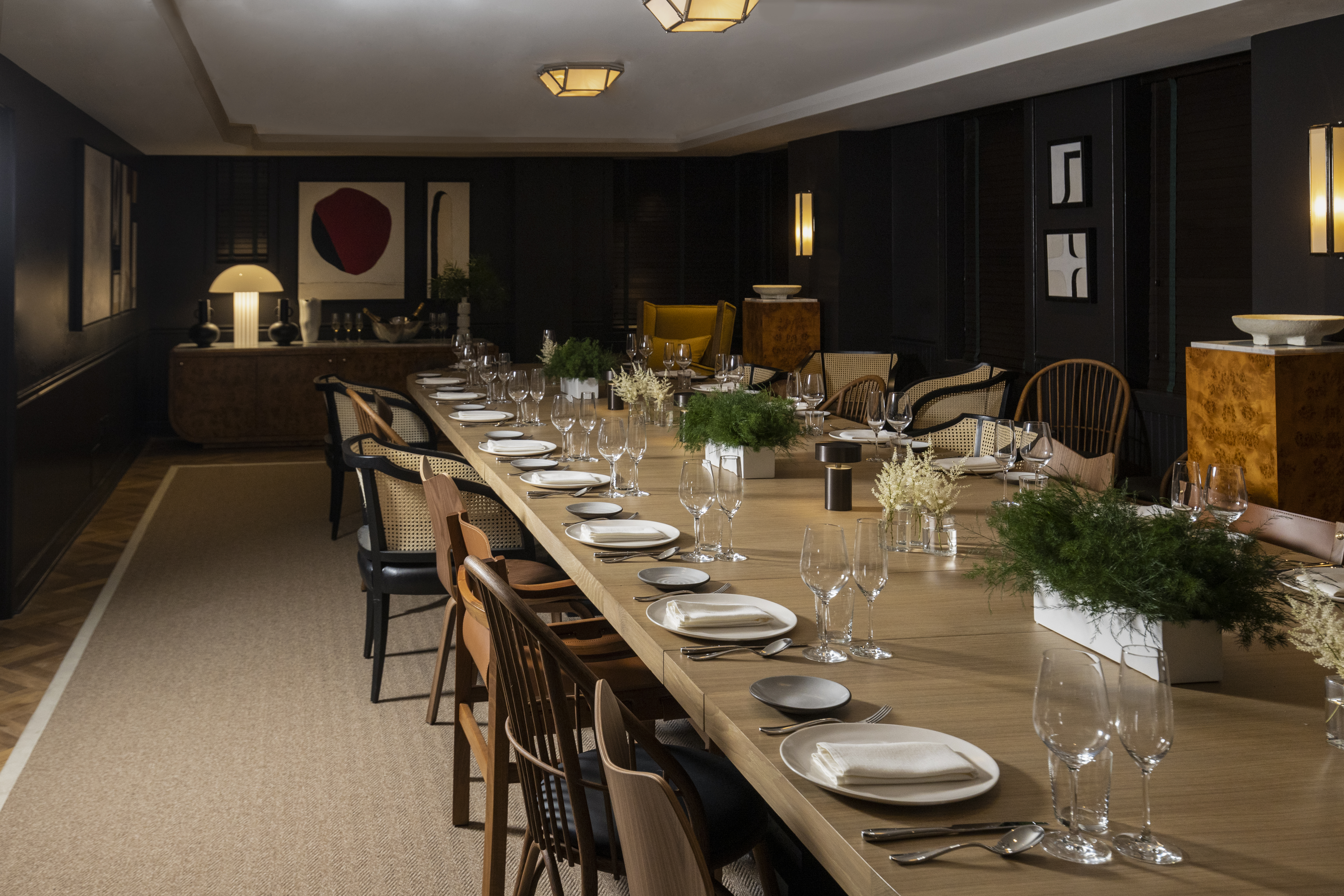 Long table in Parlor room set for dinner